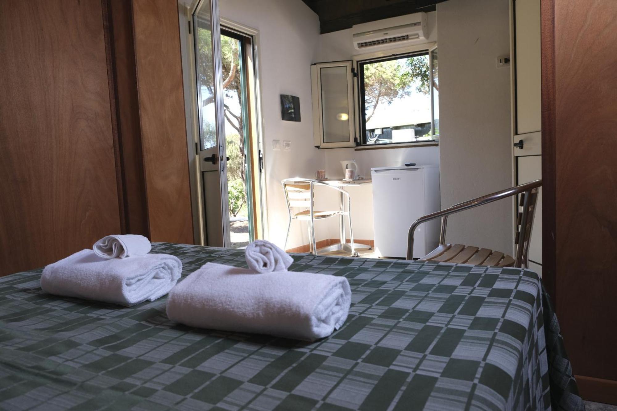 Villaggio Camping Torre Del Porticciolo ポルト・コンテ 部屋 写真